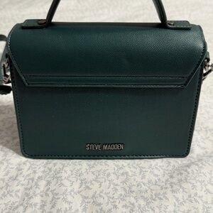 Steve Madden Teal Crossbody Bag. Uses 1 time; new! Closet kept!